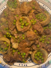 Tajine de jarret de veau aux petits pois et artichauts
